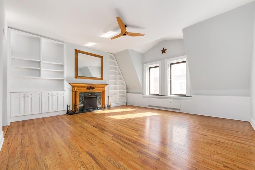 Room with fireplace in Amy Schumer's house